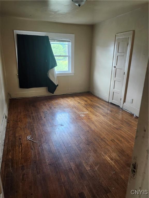 609 W Colvin St, Syracuse, NY 13205 - unfurnished room with hardwood / wood-style flooring
