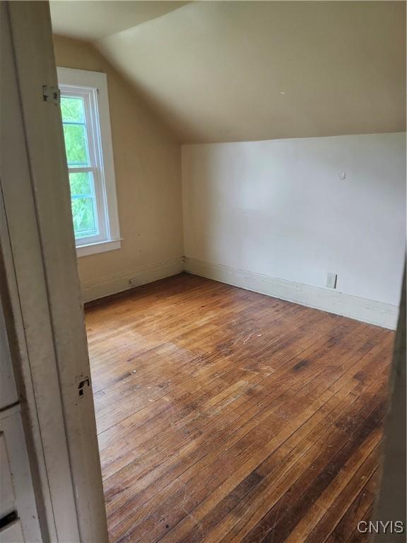 609 W Colvin St, Syracuse, NY 13205 - bonus room with lofted ceiling and hardwood / wood-style floors