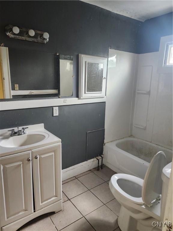 609 W Colvin St, Syracuse, NY 13205 - full bath with tile patterned flooring and vanity