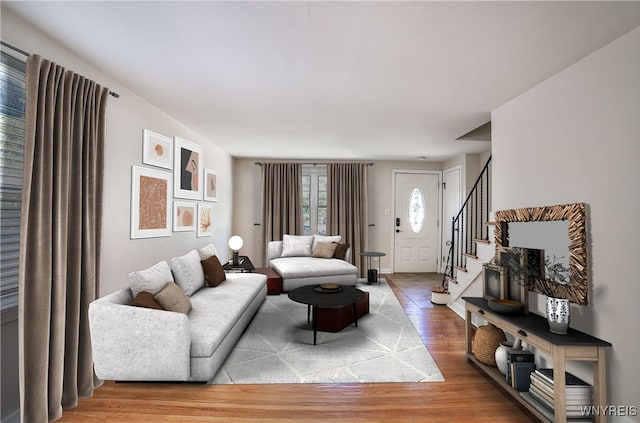 218 Hamilton Dr, Amherst, NY 14226 - living room with wood finished floors and stairway