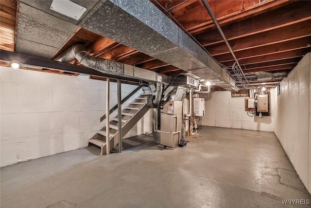 218 Hamilton Dr, Amherst, NY 14226 - unfinished basement featuring water heater, stairs, heating unit, and electric panel