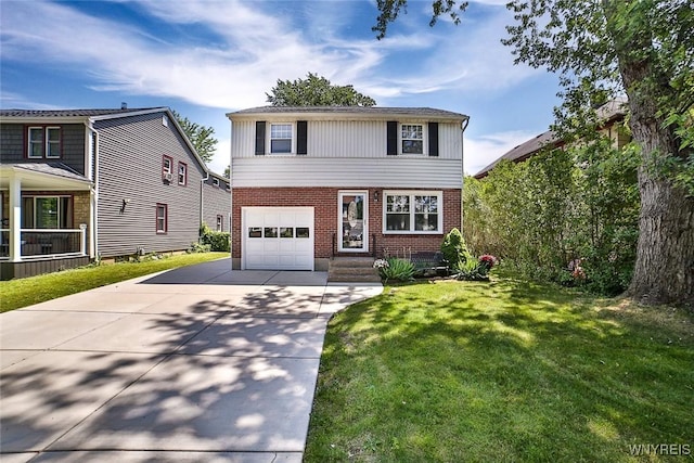 218 Hamilton Dr, Amherst, NY 14226 - view of front of home featuring brick siding, a garage, driveway, and a front lawn