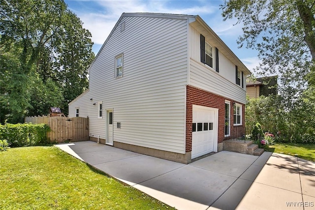 218 Hamilton Dr, Amherst, NY 14226 - view of side of home with a garage