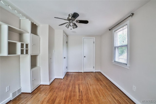 218 Hamilton Dr, Amherst, NY 14226 - unfurnished bedroom with light wood-type flooring and ceiling fan