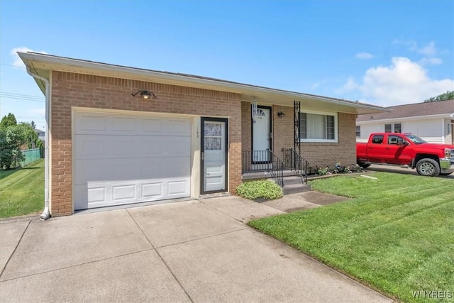 190 Gary Ln, Cheektowaga, NY 14227 - view of front facade with brick siding, driveway, a front lawn, and an attached garage