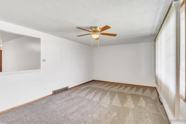 190 Gary Ln, Cheektowaga, NY 14227 - carpeted spare room with a ceiling fan and a textured ceiling