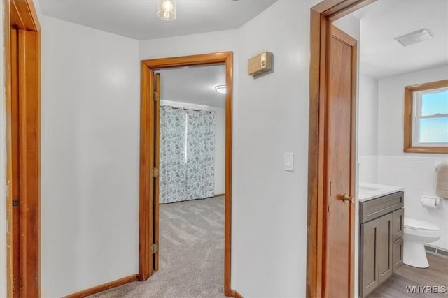 190 Gary Ln, Cheektowaga, NY 14227 - hallway featuring light colored carpet