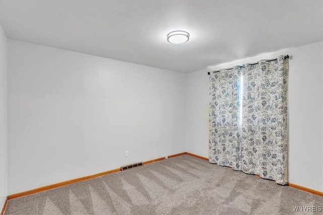190 Gary Ln, Cheektowaga, NY 14227 - carpeted empty room with baseboards