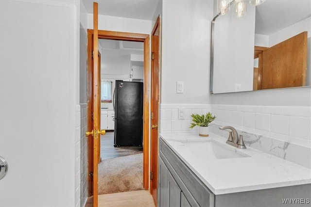 190 Gary Ln, Cheektowaga, NY 14227 - bathroom with wood finished floors and vanity