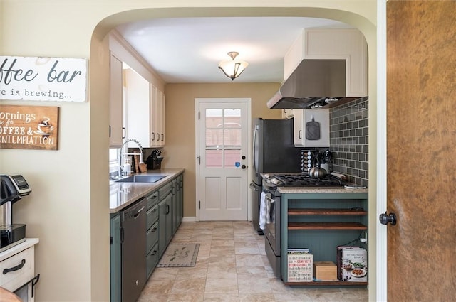 15 Baycrest Dr, Irondequoit, NY 14622 - kitchen featuring stainless steel appliances, extractor fan, arched walkways, decorative backsplash, and light countertops