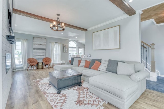 28 Blaydon Loop, Henrietta, NY 14586 - living room featuring a chandelier, beamed ceiling, wood finished floors, recessed lighting, and stairway