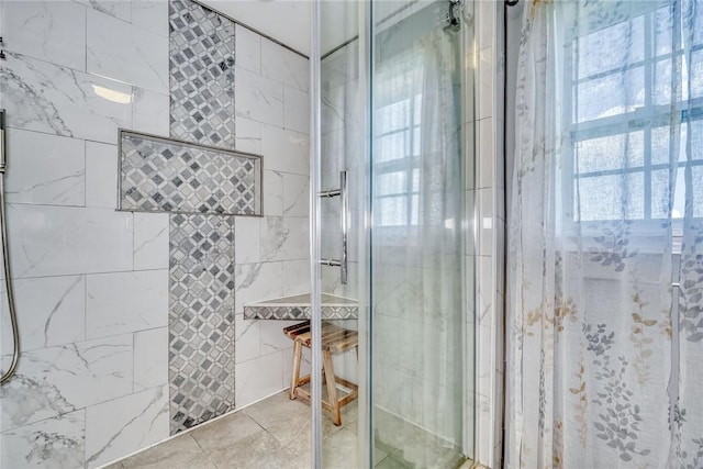 28 Blaydon Loop, Henrietta, NY 14586 - bathroom featuring a shower stall, tile patterned flooring, and tile walls