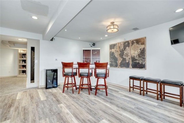 28 Blaydon Loop, Henrietta, NY 14586 - dining area with wood finished floors, recessed lighting, beamed ceiling, and a dry bar
