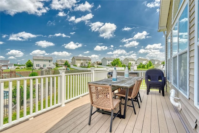 28 Blaydon Loop, Henrietta, NY 14586 - deck with a residential view, a shed, outdoor dining space, and a fenced backyard