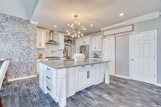 28 Blaydon Loop, Henrietta, NY 14586 - kitchen featuring wall chimney exhaust hood, stainless steel fridge with ice dispenser, a chandelier, dark wood finished floors, and white cabinets