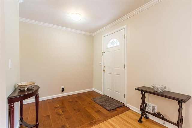 45 Barnfield Rd, Henrietta, NY 14534 - entrance foyer featuring wood finished floors and crown molding