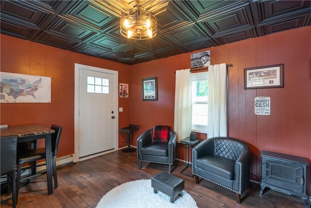 70 E Main St, Avon, NY 14414 - living area featuring healthy amount of natural light, an ornate ceiling, wood finished floors, and wooden walls