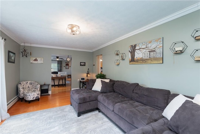 70 E Main St, Avon, NY 14414 - living area with light wood-style flooring, ornamental molding, and a baseboard radiator