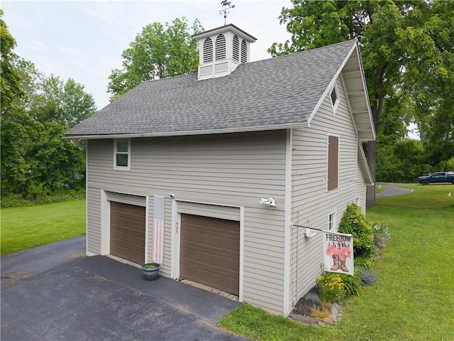 70 E Main St, Avon, NY 14414 - garage featuring driveway