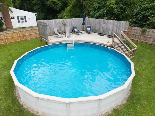 70 E Main St, Avon, NY 14414 - view of pool featuring a wooden deck and a fenced backyard