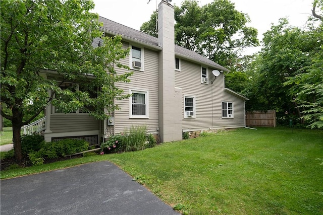 70 E Main St, Avon, NY 14414 - view of property exterior featuring a chimney