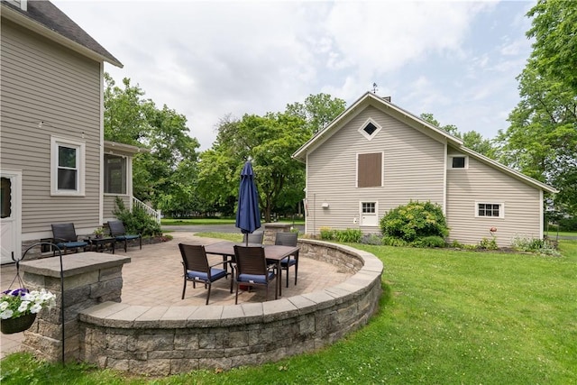 70 E Main St, Avon, NY 14414 - view of grassy yard with a patio area