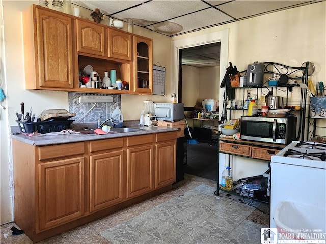 296 Falconer St, Jamestown, NY 14701 - kitchen featuring white appliances, a drop ceiling, brown cabinets, open shelves, and glass insert cabinets