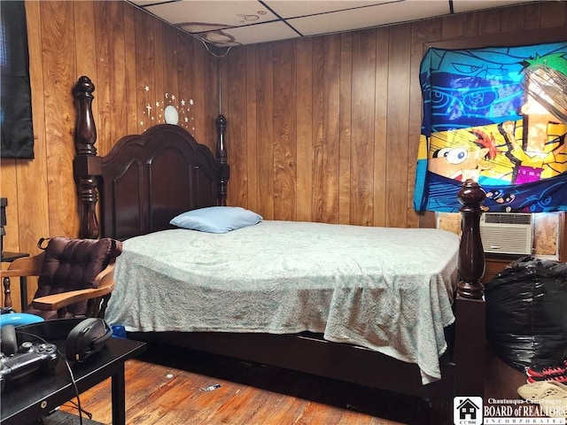296 Falconer St, Jamestown, NY 14701 - bedroom with wood walls and wood finished floors