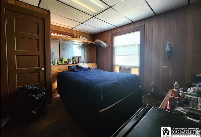 296 Falconer St, Jamestown, NY 14701 - bedroom with wood walls and cooling unit