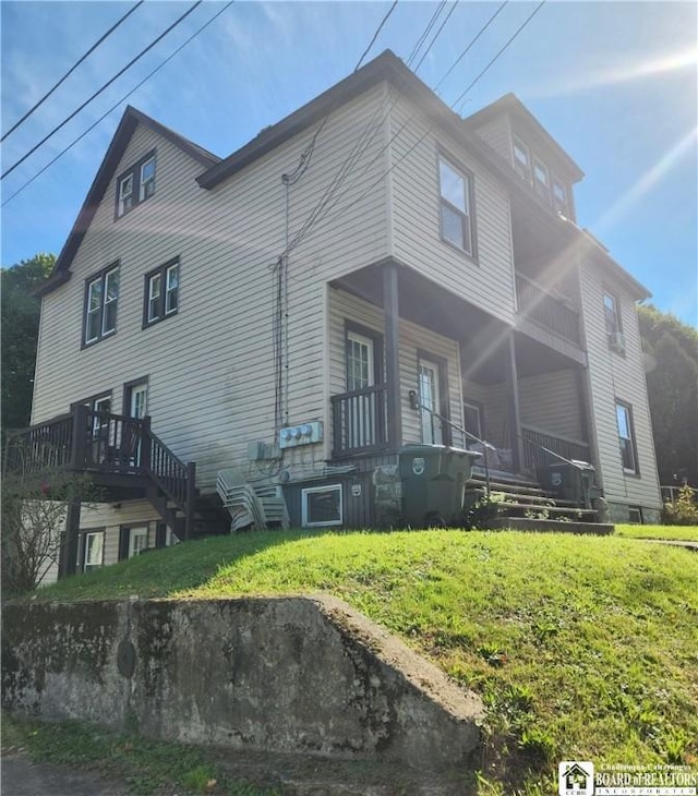 296 Falconer St, Jamestown, NY 14701 - view of side of home with a porch