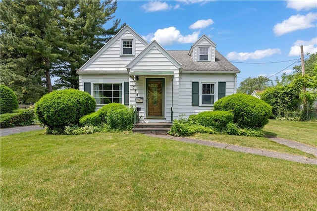 334 Woodcrest Rd, Greece, NY 14616 - view of front of house with a front lawn and roof with shingles