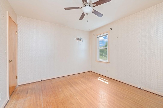 334 Woodcrest Rd, Greece, NY 14616 - empty room featuring light wood-style floors and a ceiling fan