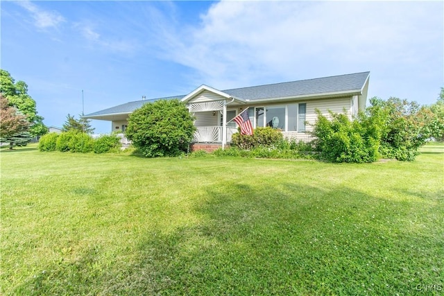 23214 County Route 59, Brownville, NY 13634 - view of front of home featuring a front lawn