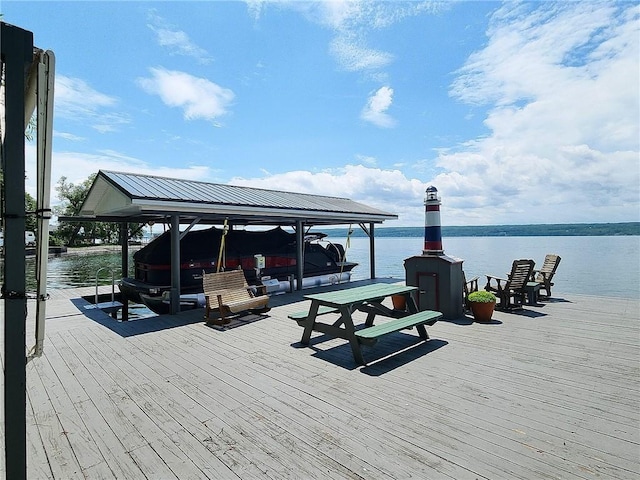 641 Fire Ln Unit 5, Genoa, NY 13081 - dock area with boat lift and a water view