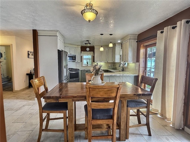 641 Fire Ln Unit 5, Genoa, NY 13081 - dining room featuring a textured ceiling and light tile patterned floors
