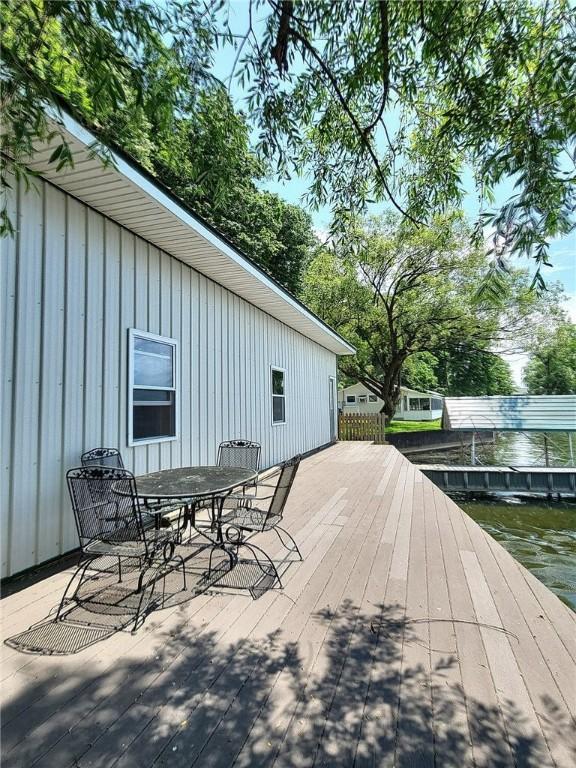 641 Fire Ln Unit 5, Genoa, NY 13081 - wooden deck with outdoor dining space