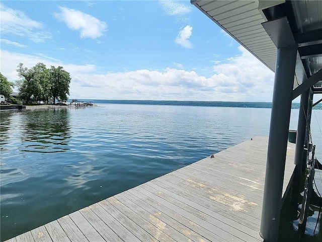 641 Fire Ln Unit 5, Genoa, NY 13081 - dock area with a water view