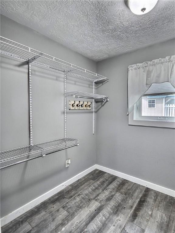641 Fire Ln Unit 5, Genoa, NY 13081 - spacious closet with wood finished floors