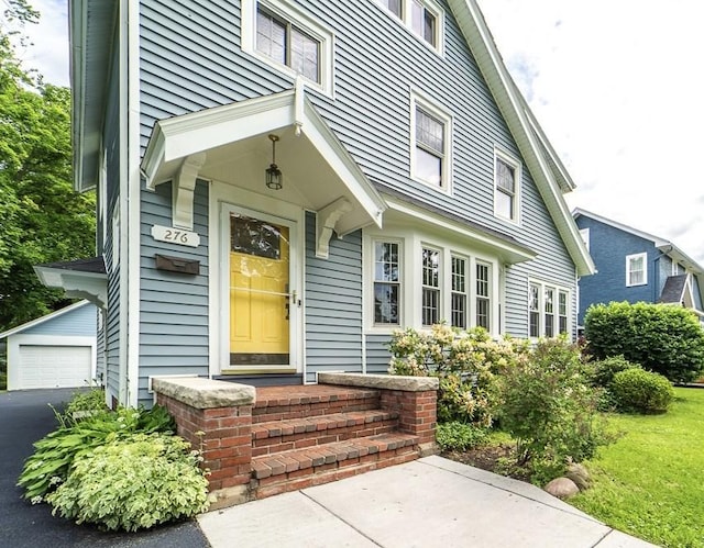 276 Susquehanna Rd, Brighton, NY 14618 - doorway to property featuring a garage