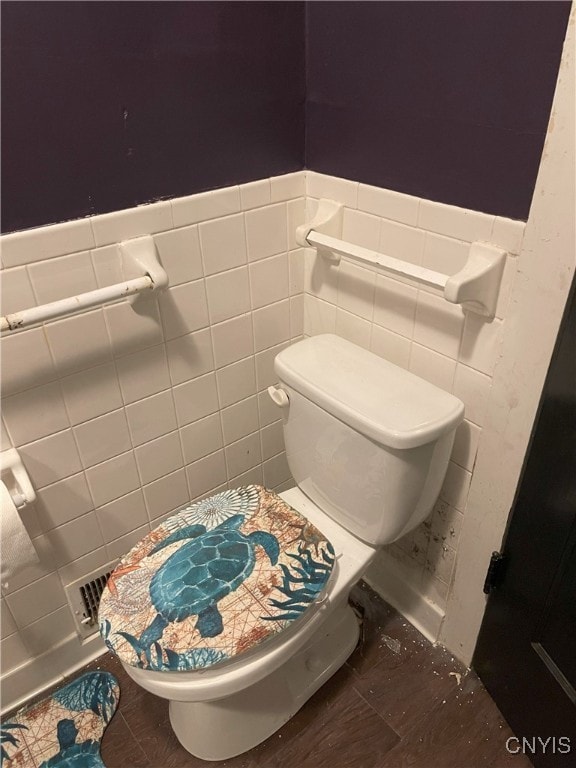 11159 State Route 34, Cato, NY 13033 - half bath featuring wainscoting and tile walls