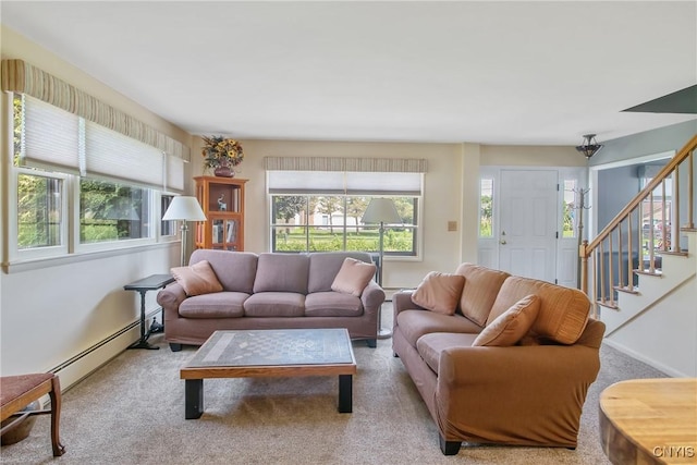 4853 Enders Rd, Manlius, NY 13104 - living area with a baseboard radiator, healthy amount of natural light, carpet floors, and stairs
