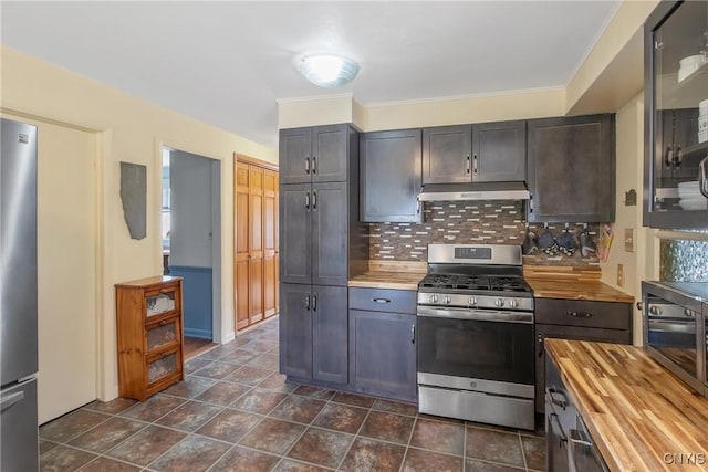 4853 Enders Rd, Manlius, NY 13104 - kitchen with butcher block countertops, stainless steel appliances, under cabinet range hood, and backsplash