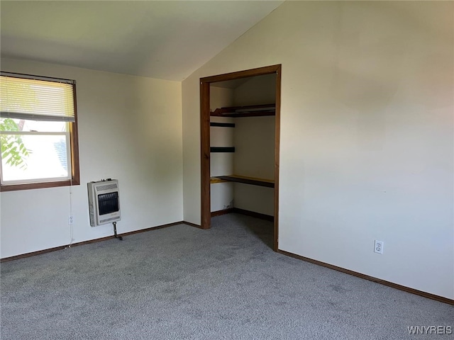 50 Ideal St, Buffalo, NY 14206 - unfurnished bedroom featuring heating unit, carpet floors, vaulted ceiling, a spacious closet, and a closet