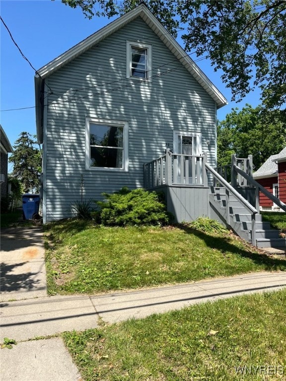 50 Ideal St, Buffalo, NY 14206 - view of side of home with a lawn and stairway