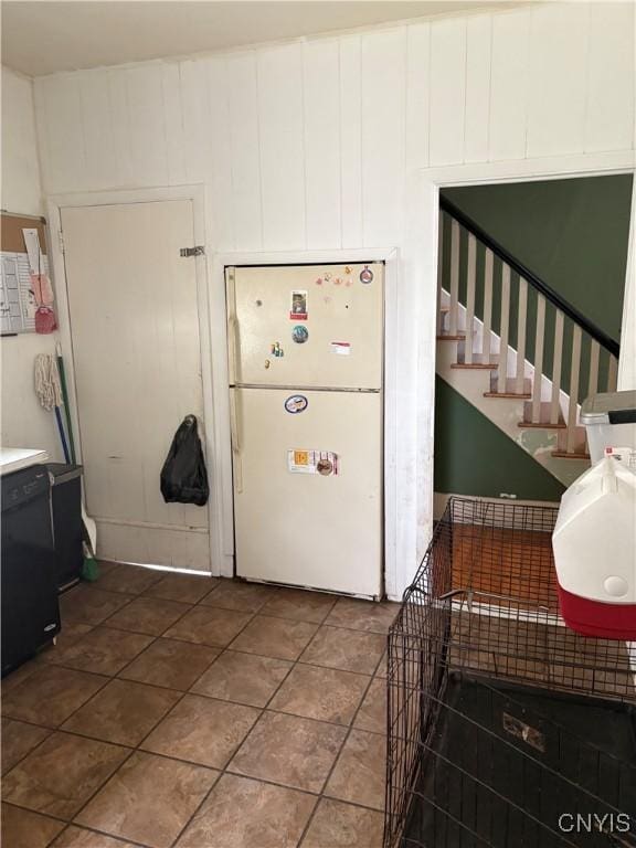 1905 S Geddes St, Syracuse, NY 13207 - kitchen with freestanding refrigerator and white cabinets