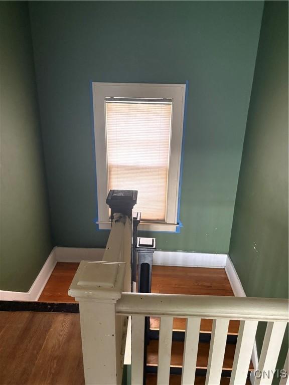 1905 S Geddes St, Syracuse, NY 13207 - stairs with baseboards and wood finished floors