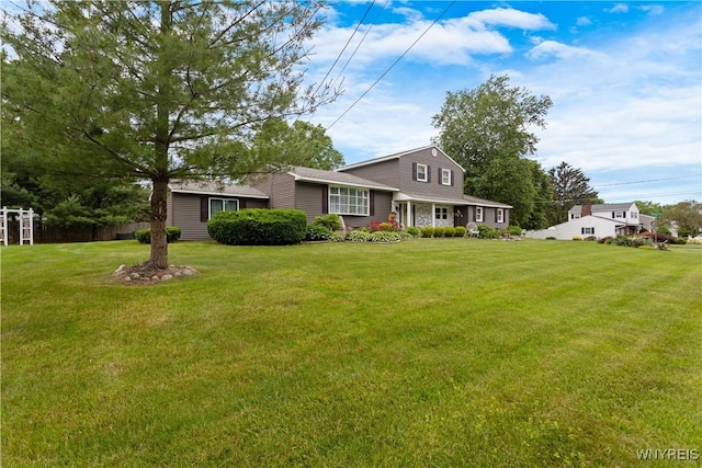 7438 Thunderbird Rd, Clay, NY 13088 - traditional home with a front lawn