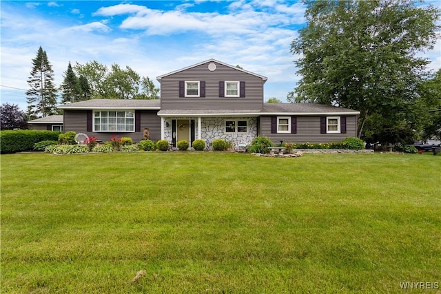 7438 Thunderbird Rd, Clay, NY 13088 - view of front of house featuring a front yard and stone siding