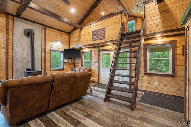45 Fawn Lake Rd, Orwell, NY 13302 - living area with wood ceiling, wood walls, a wood stove, wood finished floors, and stairs