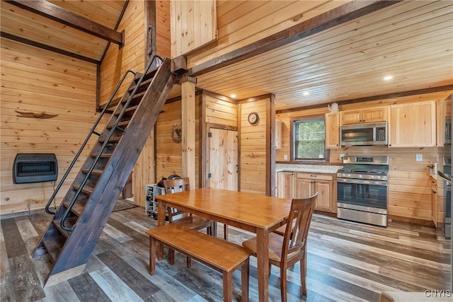 45 Fawn Lake Rd, Orwell, NY 13302 - dining room featuring heating unit, wood walls, wooden ceiling, dark wood-style flooring, and recessed lighting
